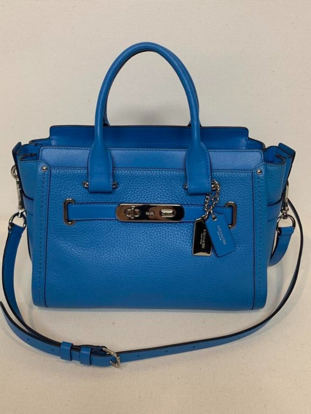 vibrant blue Coach Swagger